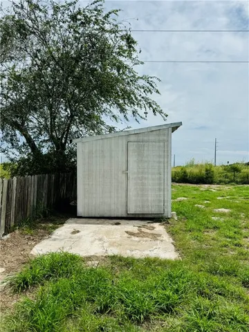 a view of backyard with green space