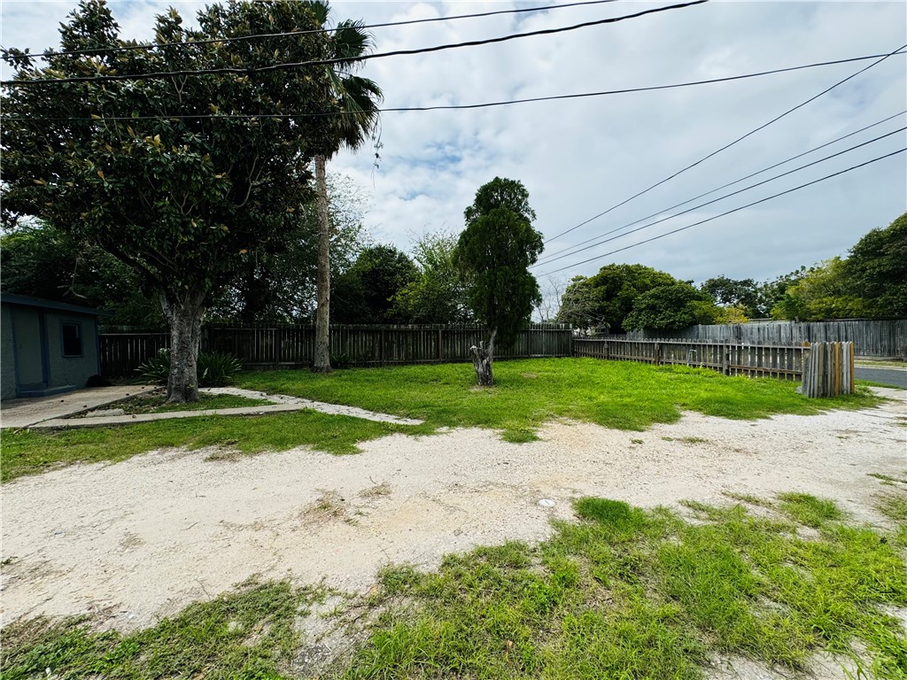 713 Jane Street Corpus Christi, TX 78418 - Photo 16 of 18 a view of a street with a big trees