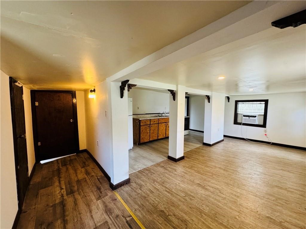 713 Jane Street Corpus Christi, TX 78418 - Photo 2 of 18 a view of empty room with wooden floor