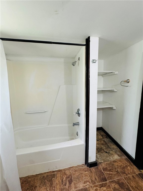 713 Jane Street Corpus Christi, TX 78418 - Photo 9 of 18 a bathroom with a bathtub