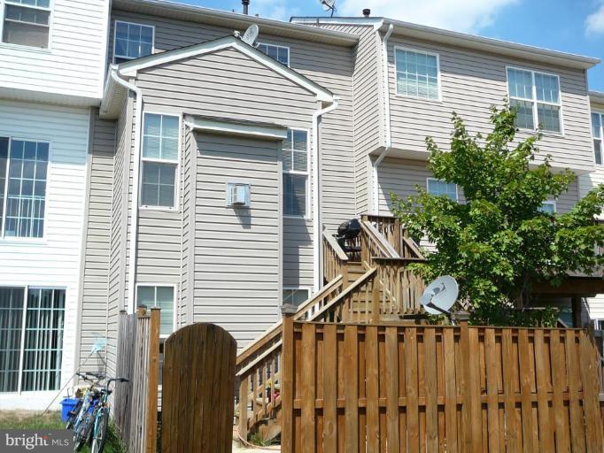 654 Wild Hunt Road Frederick, MD 21703 - Photo 14 of 17 a view of a house with wooden fence