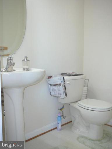 654 Wild Hunt Road Frederick, MD 21703 - Photo 6 of 17 a bathroom with a sink and a toilet