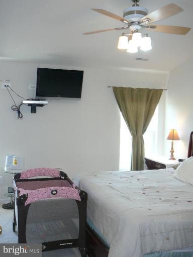 654 Wild Hunt Road Frederick, MD 21703 - Photo 8 of 17 a view of a room with a flat screen tv