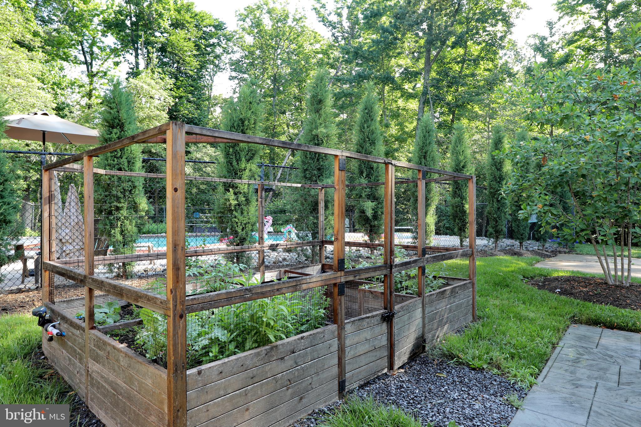 15111 Cactus Hill Road Accokeek, MD 20607 - Photo 12 of 44 a view of a chair and tables in the patio