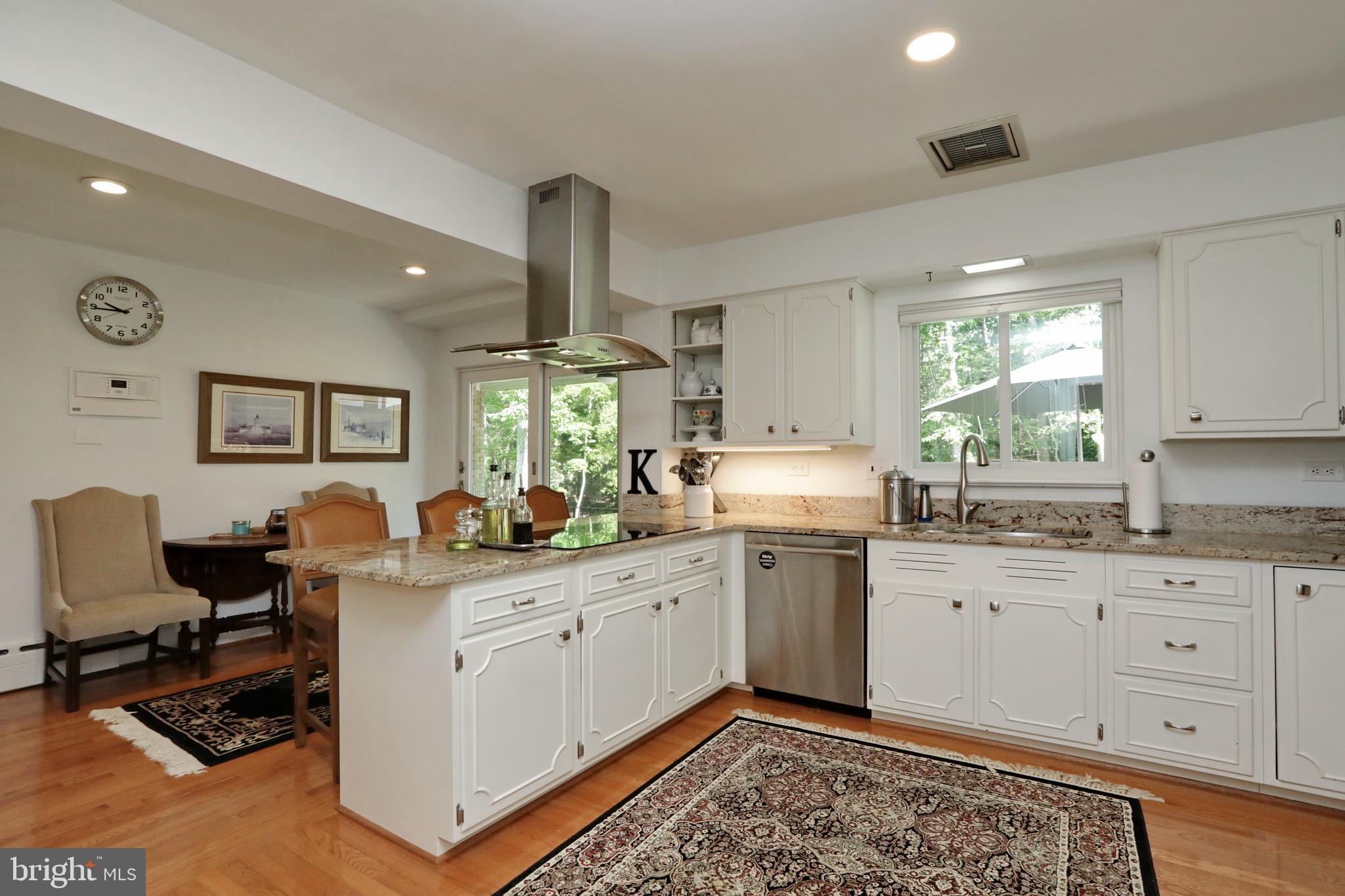 15111 Cactus Hill Road Accokeek, MD 20607 - Photo 17 of 44 a kitchen with granite countertop a sink cabinets and window