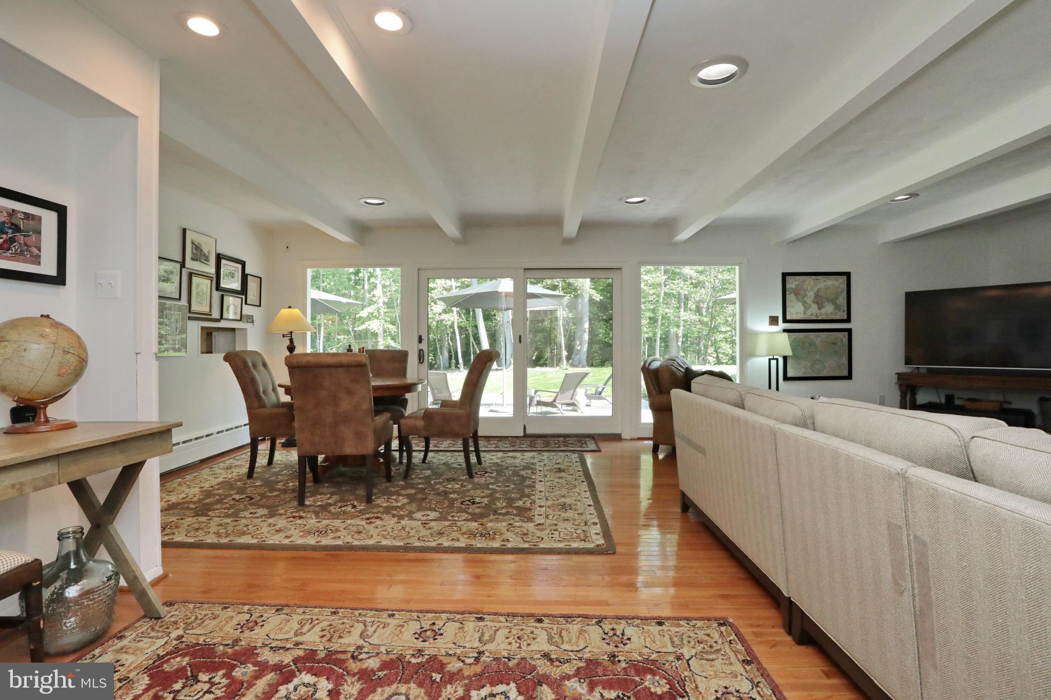 15111 Cactus Hill Road Accokeek, MD 20607 - Photo 24 of 44 a living room with furniture and a flat screen tv