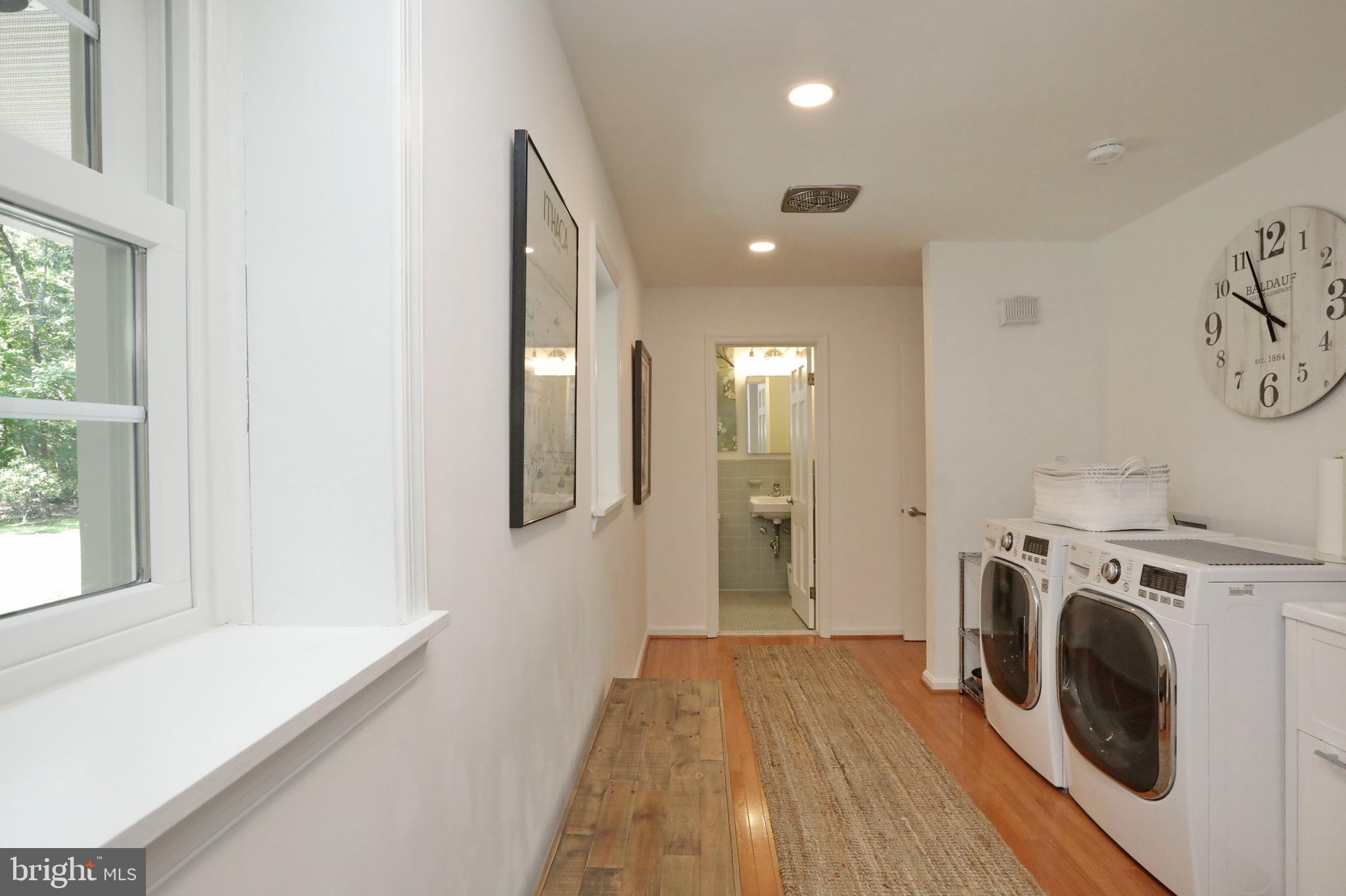 15111 Cactus Hill Road Accokeek, MD 20607 - Photo 26 of 44 a view of a hallway with washer and dryer