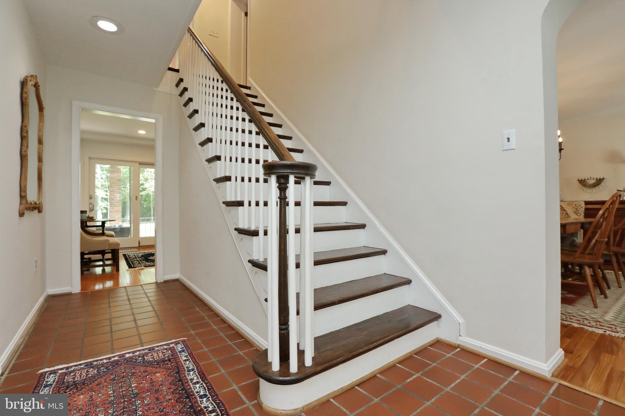 15111 Cactus Hill Road Accokeek, MD 20607 - Photo 28 of 44 a view of entryway with dining room and stairs