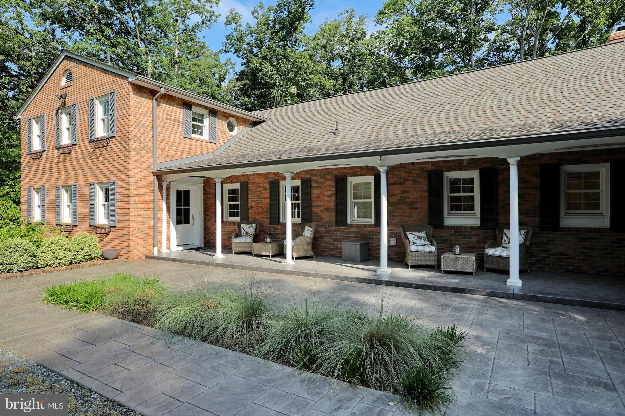 15111 Cactus Hill Road Accokeek, MD 20607 - Photo 3 of 44 a front view of a house with a patio