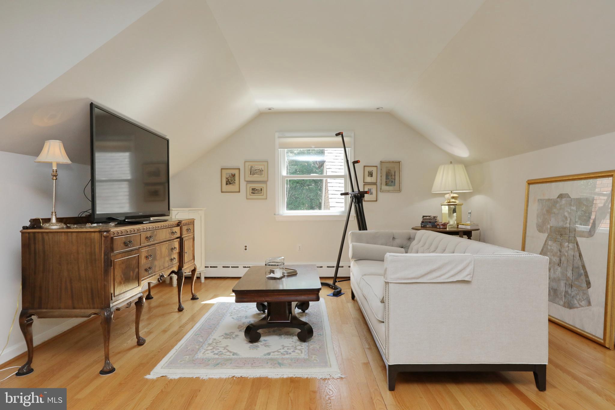 15111 Cactus Hill Road Accokeek, MD 20607 - Photo 32 of 44 a living room with furniture and a flat screen tv