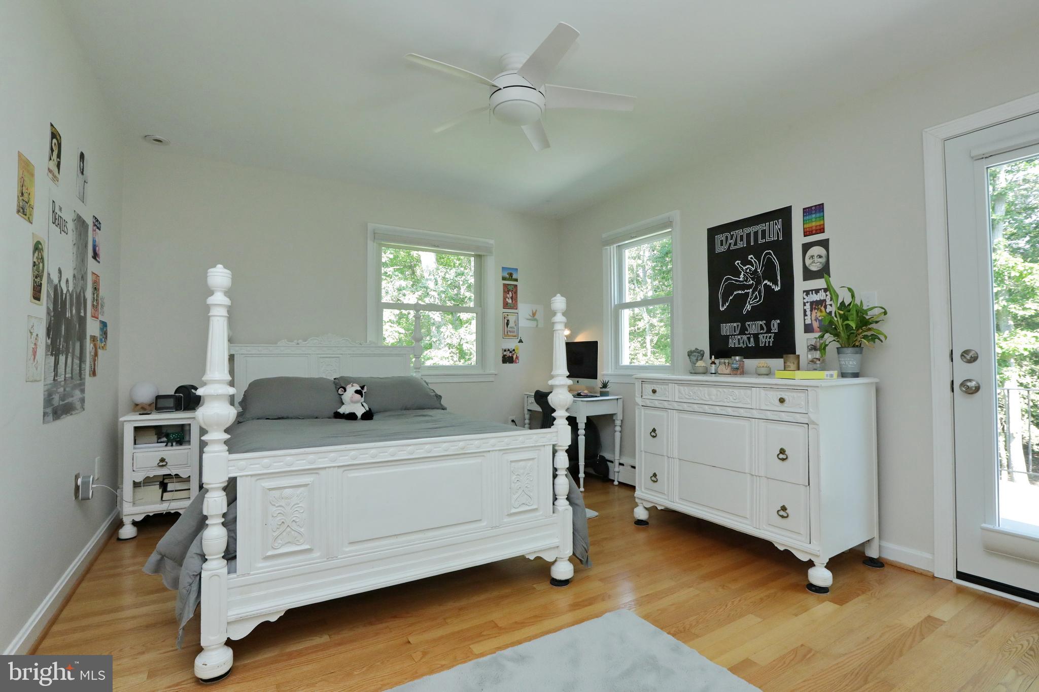 15111 Cactus Hill Road Accokeek, MD 20607 - Photo 34 of 44 a room with a bed and a mirror on dresser