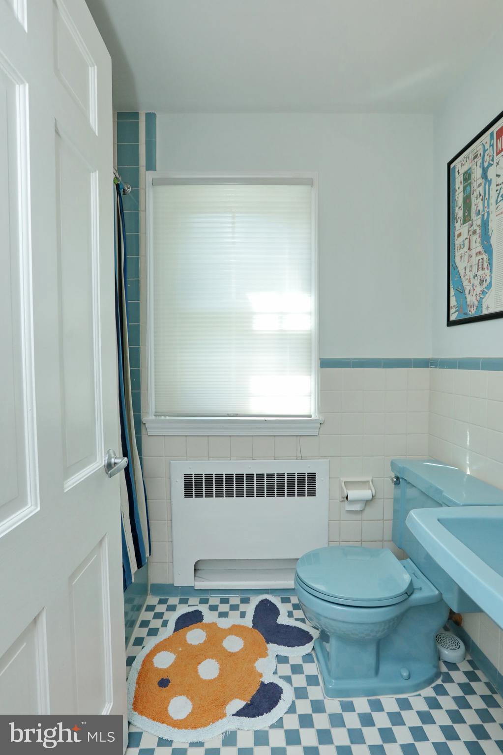 15111 Cactus Hill Road Accokeek, MD 20607 - Photo 39 of 44 a bathroom with a toilet a sink and a mirror