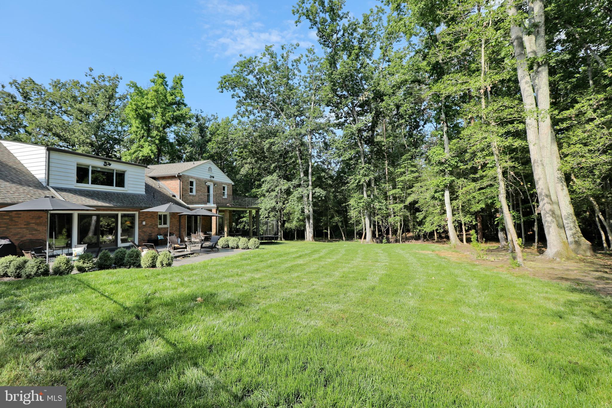 15111 Cactus Hill Road Accokeek, MD 20607 - Photo 41 of 44 a front view of a house with a yard