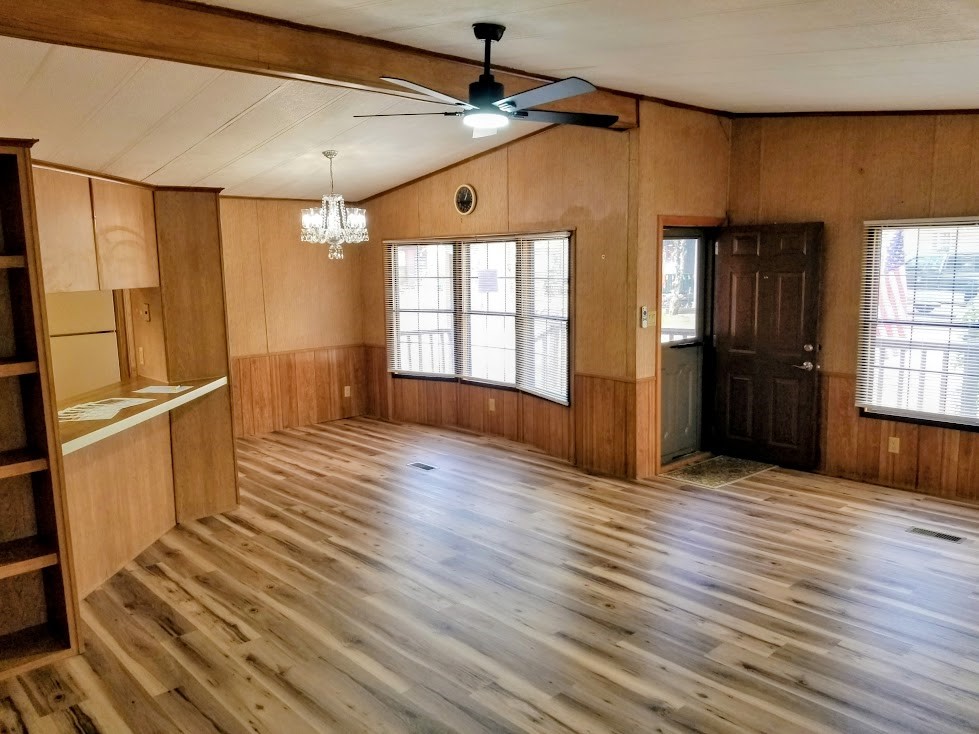 41 Leisure Way Coventry, RI 02816 - Photo 11 of 24 Living Room facing front entry and Dining Area