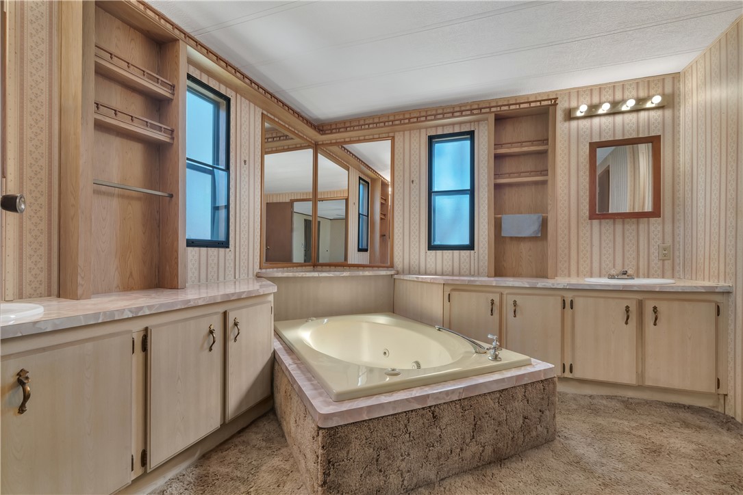 41 Leisure Way Coventry, RI 02816 - Photo 16 of 19 Primary bathroom w/jetted tub & double vanity