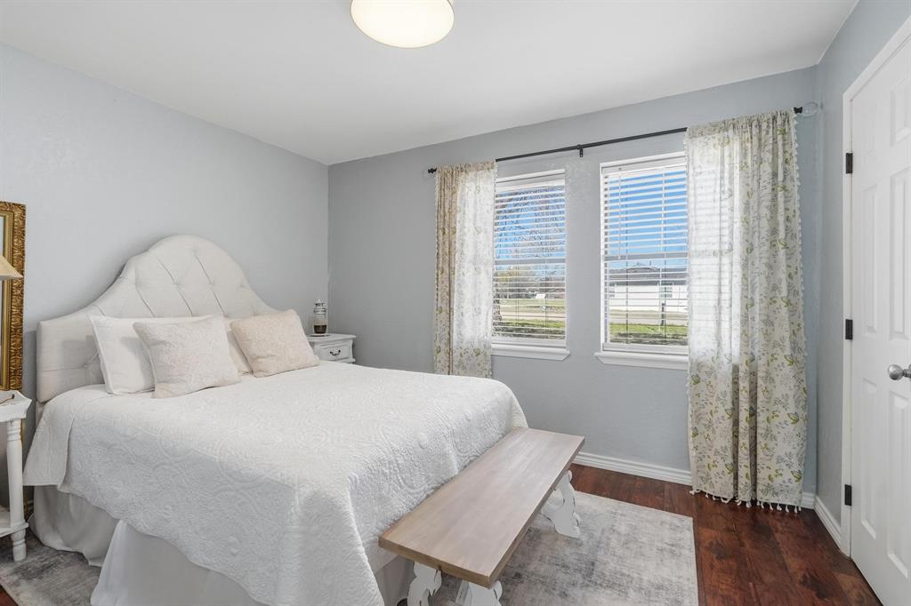 121 Sandy Lane Clyde, TX 79510 - Photo 21 of 30 a bedroom with a bed and a window