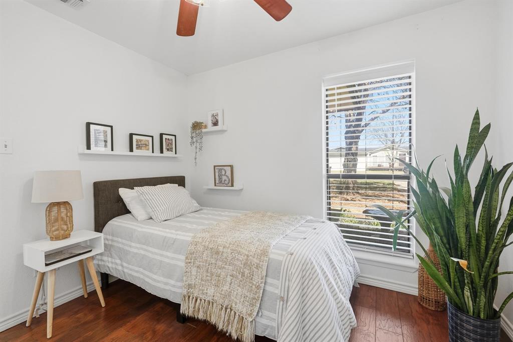 121 Sandy Lane Clyde, TX 79510 - Photo 23 of 30 a bedroom with a bed and a window