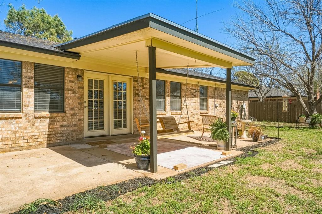 121 Sandy Lane Clyde, TX 79510 - Photo 26 of 30 a view of a house with a backyard