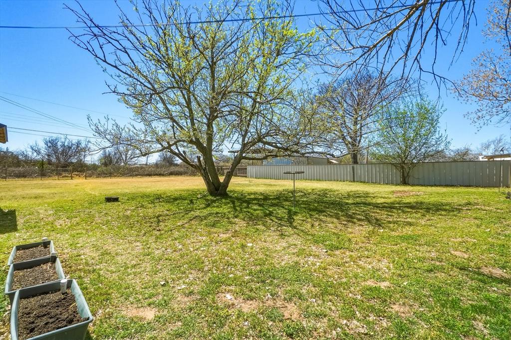 121 Sandy Lane Clyde, TX 79510 - Photo 27 of 30 a view of a yard with an outdoor space