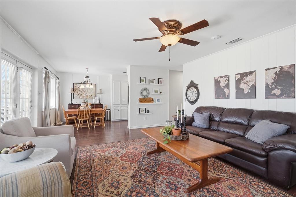 121 Sandy Lane Clyde, TX 79510 - Photo 5 of 30 a living room with furniture a rug and a large window