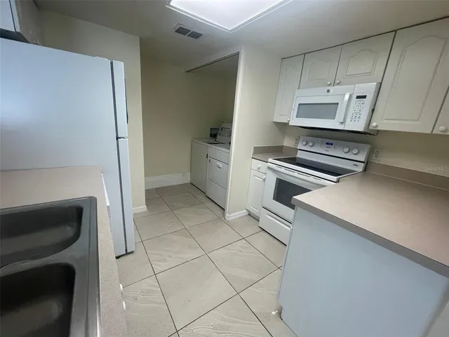 a view of a hallway with entryway