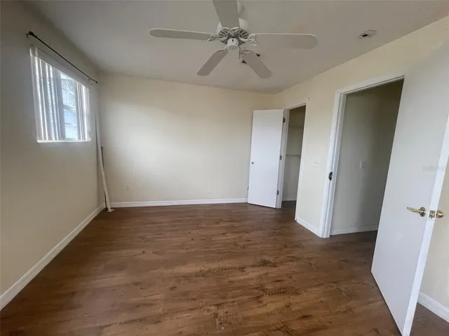 a spacious bathroom with a bathtub and a shower