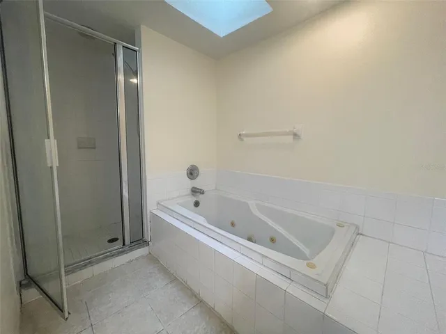 a bathroom with a sink double vanity and a mirror