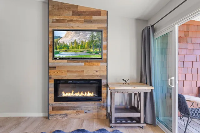 a room with fireplace and window