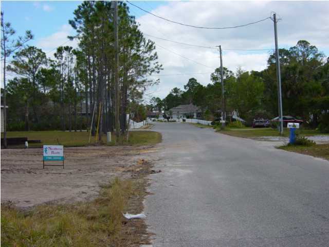 Lot 2 Pritchard Road Destin, FL 32550 - Photo 2 of 3 a view of a park with swings and slides