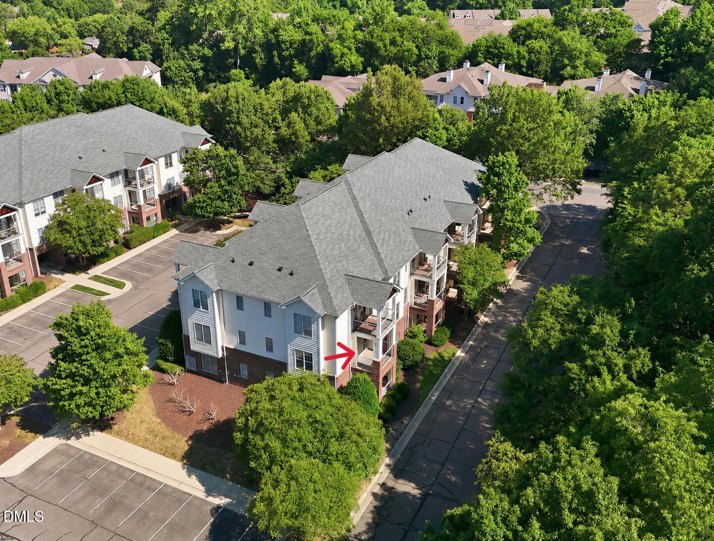801 Moratuck Drive, Unit 202 Raleigh, NC 27604 - Photo 1 of 23 an aerial view of multiple houses with yard