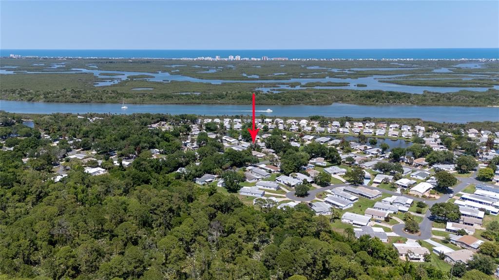 501 Topside Circle Edgewater, FL 32141 - Photo 2 of 47 a view of a city with an ocean