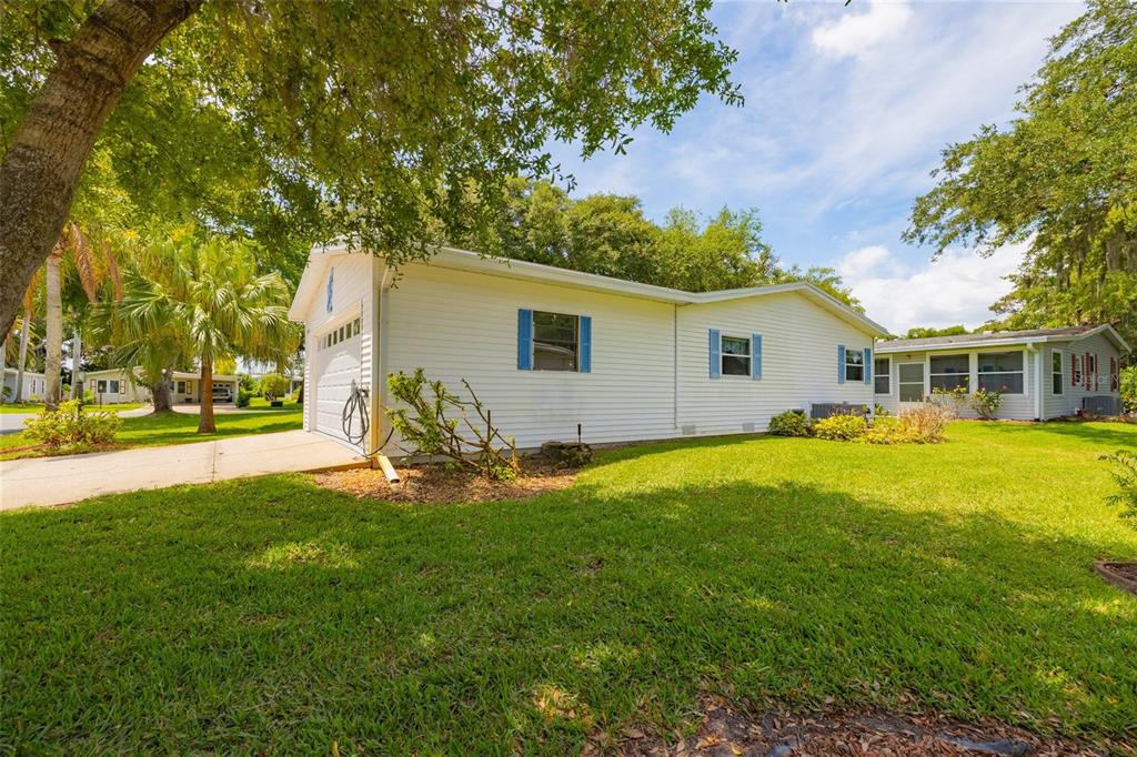 501 Topside Circle Edgewater, FL 32141 - Photo 6 of 47 a house view with swimming pool in front of it