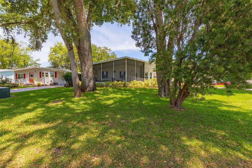 501 Topside Circle Edgewater, FL 32141 - Photo 8 of 47 a view of a house with a big yard