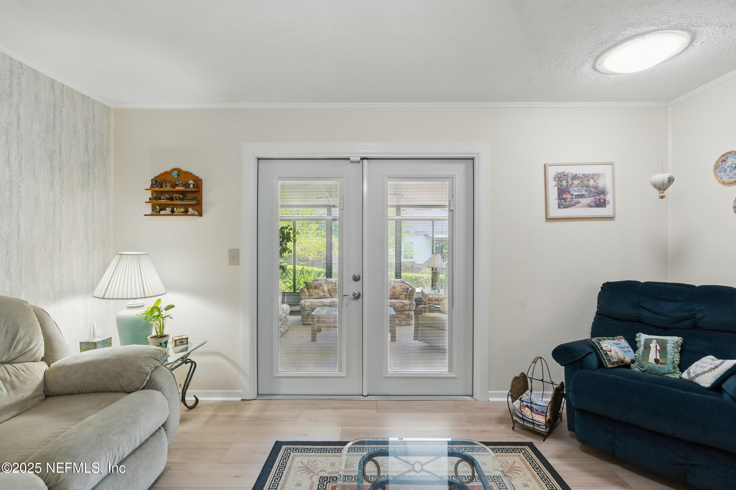 1257 Crown Drive Jacksonville, FL 32221 - Photo 9 of 21 a living room with furniture and a window