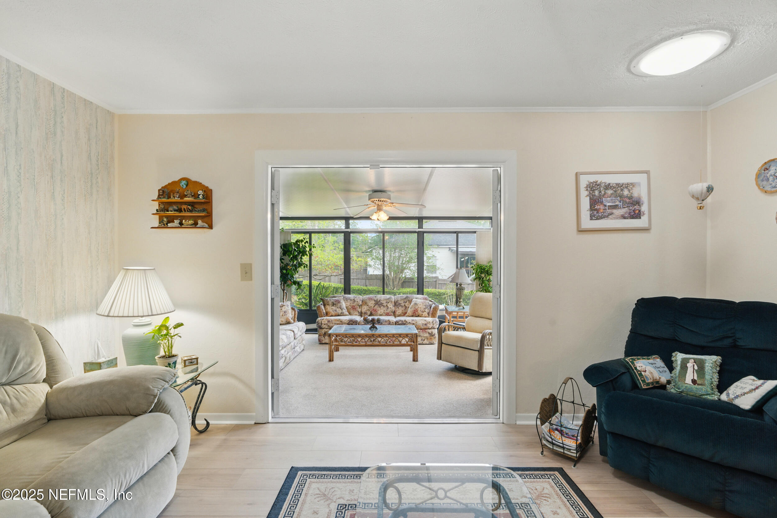 1257 Crown Drive Jacksonville, FL 32221 - Photo 10 of 21 a living room with furniture and a window