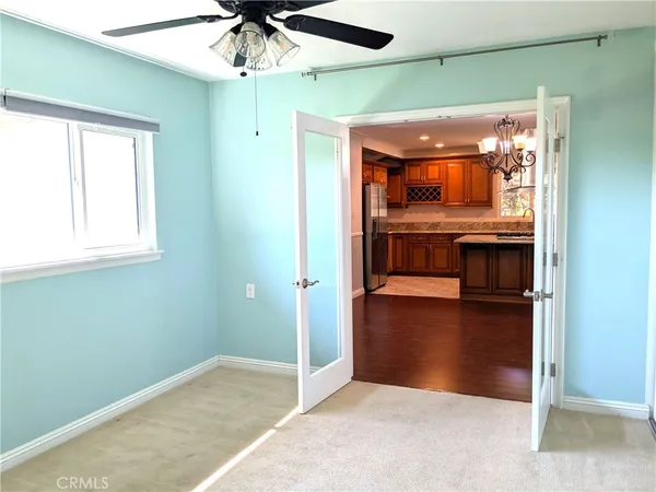 a view of livingroom with kitchen