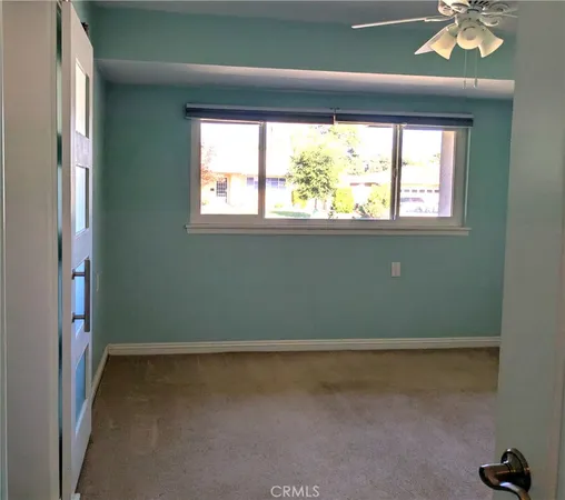a view of a room that has a window
