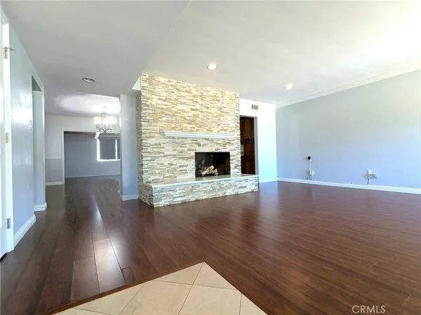 a view of a livingroom with wooden floor