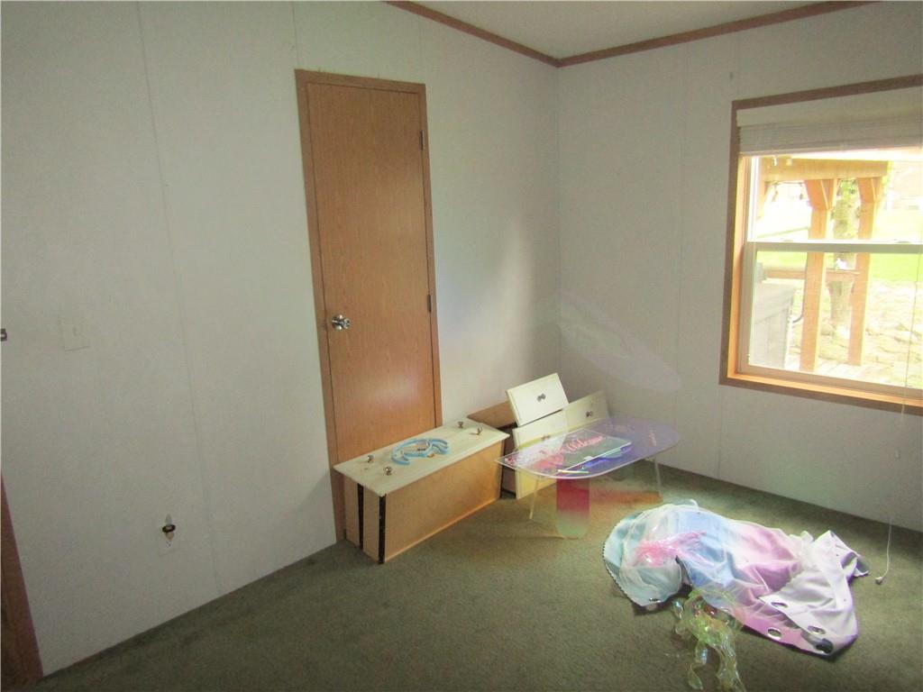 521 Williams Street Confluence, PA 15424 - Photo 11 of 38 a bedroom with bed and a window