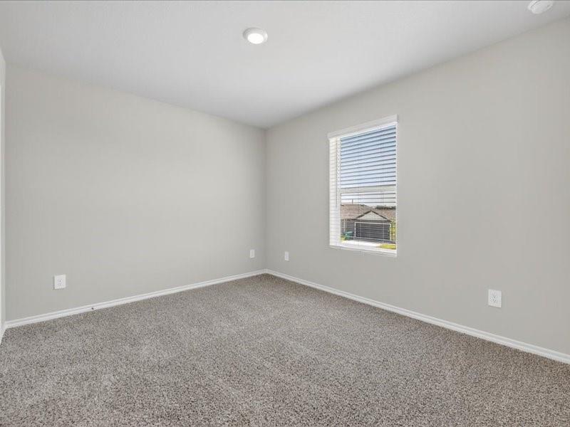 5568 Corduroy Road Krum, TX 76249 - Photo 11 of 23 an empty room with a window