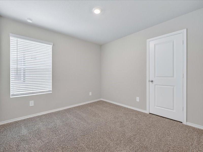 5568 Corduroy Road Krum, TX 76249 - Photo 12 of 23 a view of an empty room with a window