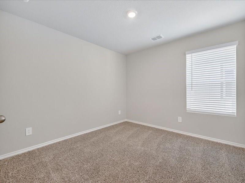 5568 Corduroy Road Krum, TX 76249 - Photo 13 of 23 an empty room with a window