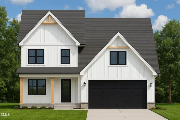 a front view of a house with garage