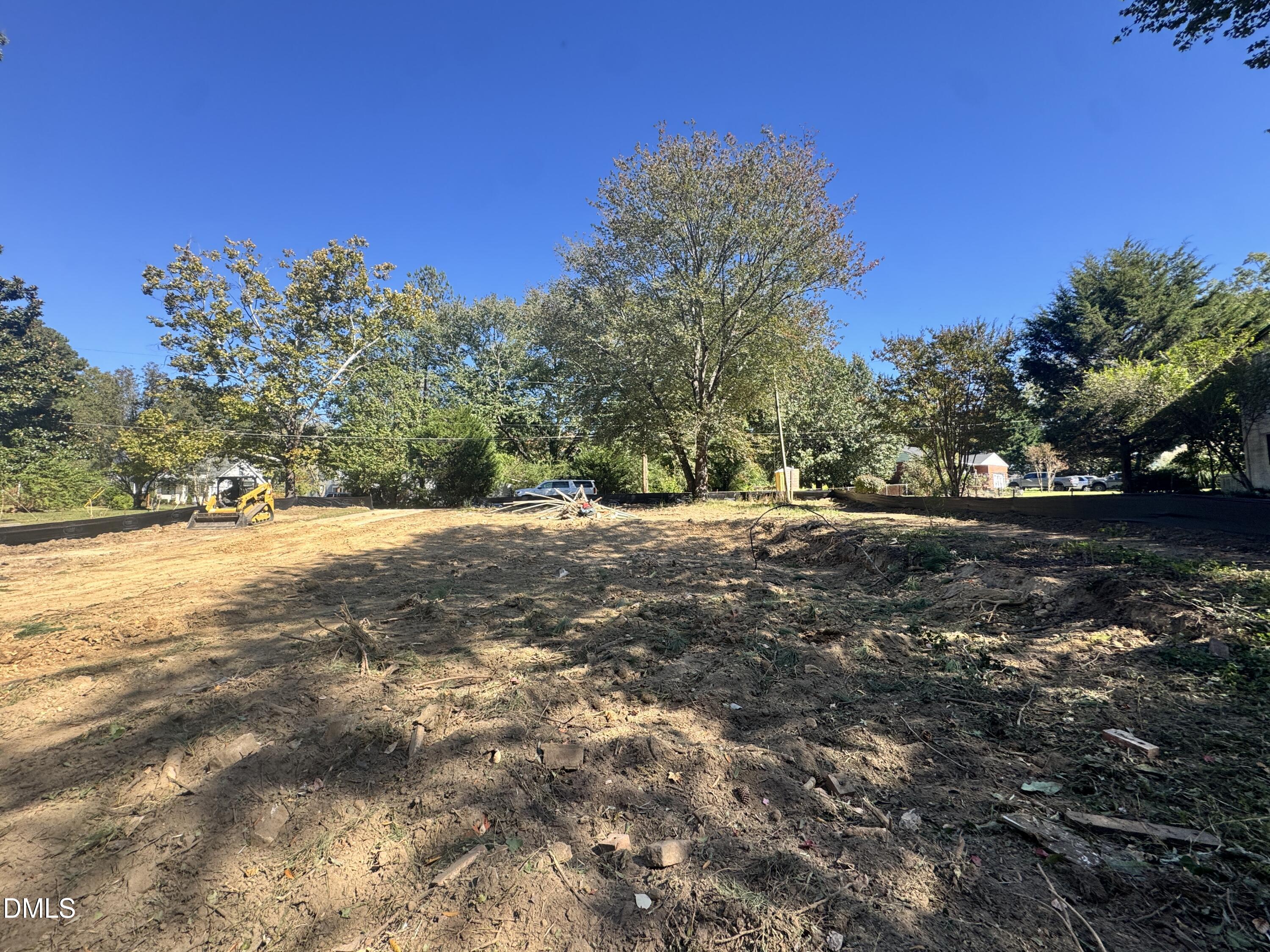 1004 Pond Street Cary, NC 27511 - Photo 3 of 8 a view of outdoor space with trees all around