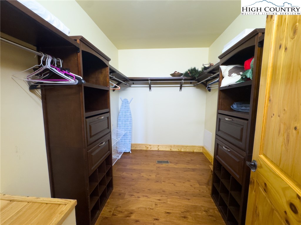 150 Tuscany Ridge Sugar Grove, NC 28679 - Photo 16 of 45 a view of walk in closet with clothes and shoes