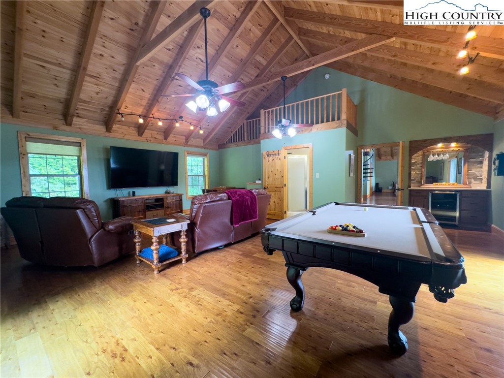 150 Tuscany Ridge Sugar Grove, NC 28679 - Photo 29 of 45 a room with furniture pool table flat screen tv and windows