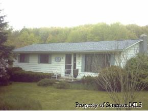 84 Ripplebrook Road Tunkhannock, PA 18657 - Photo 1 of 3 a view of a house with a yard