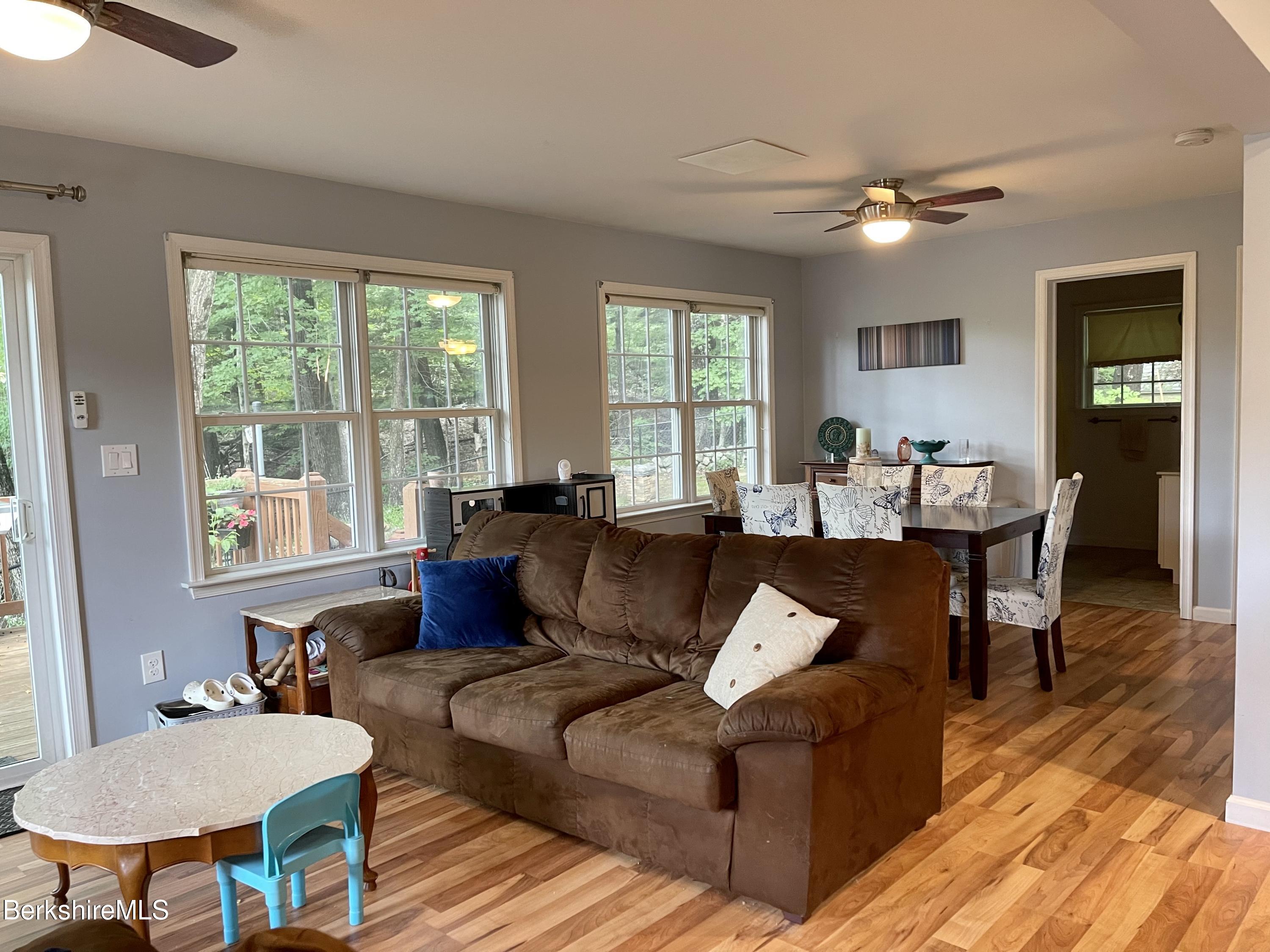 3512 Jacobs Ladder Road Becket, MA 01223 - Photo 13 of 42 a living room with furniture and a large window