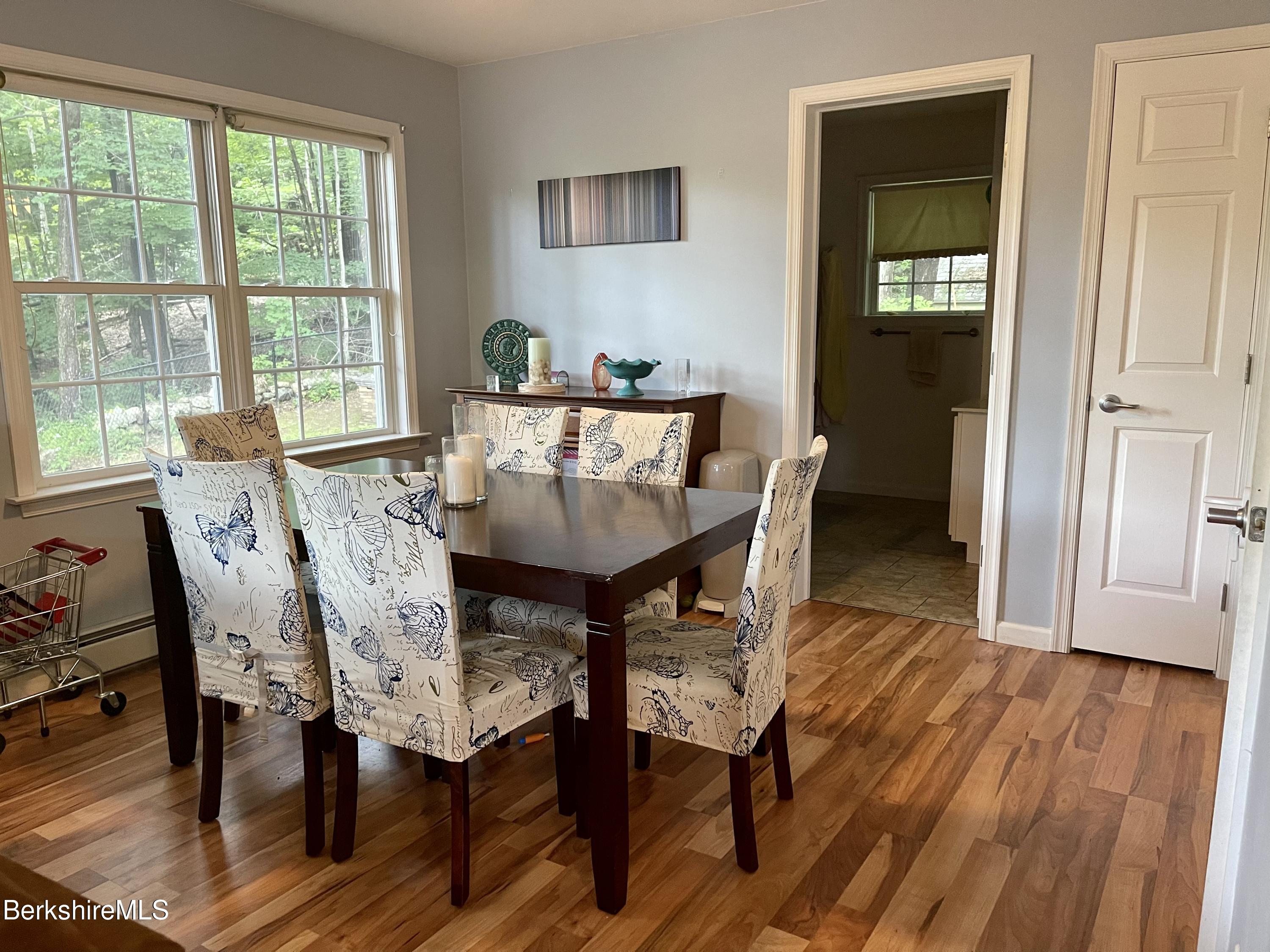 3512 Jacobs Ladder Road Becket, MA 01223 - Photo 14 of 42 a view of a dining room with furniture and wooden floor