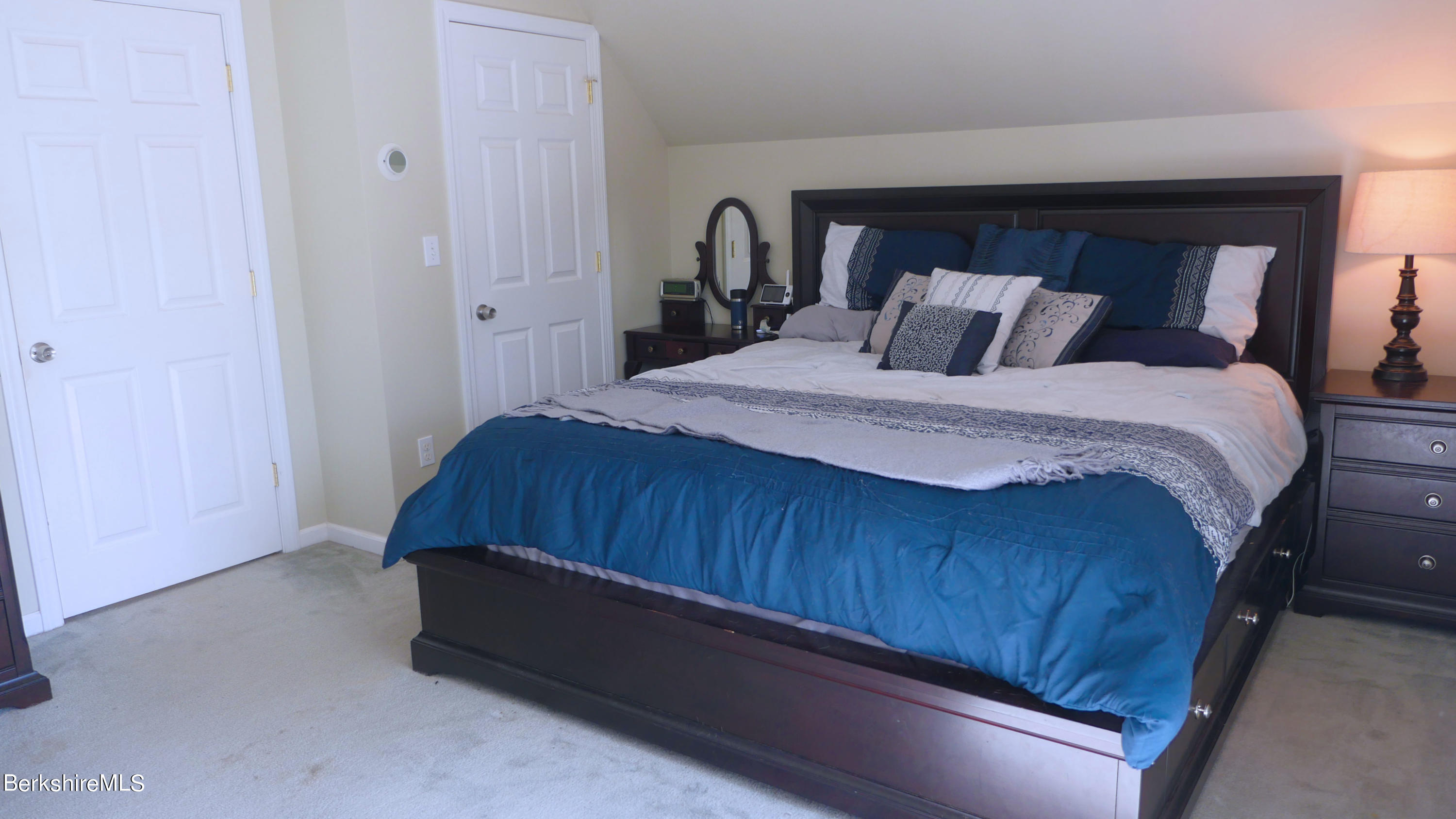 3512 Jacobs Ladder Road Becket, MA 01223 - Photo 18 of 42 a bedroom with a bed and a dresser